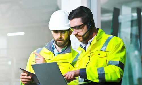 man-working-and-videochatting-on-computer-at-production.-800×300 man-working-and-videochatting-on-computer-at-production.-800x300